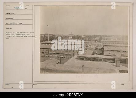 Aerial view of Tulane University in New Orleans, Louisiana, showing the various buildings including barracks, shops, a mess hall, and a gymnasium. This photograph is part of the collection documenting American military activities during World War One. It was taken on April 27, 1919, by the S.A.T.C. photographer with the identification number RECO 4-27-19 TAKEN. The image has the official classification as ISSUED SUNR 58755 AU and is labeled as H, which signifies it is for official use only. Stock Photo