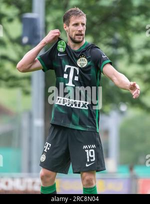 Budapest, Hungary. 31st August, 2023. Barnabas Varga of Ferencvarosi TC  competes for the ball with Nassim Hnid of FK Zalgiris Vilnius during the  UEFA Europa Conference League Play Off Round Second Leg