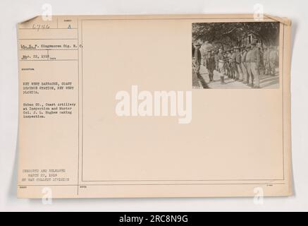 Caption: Cuban Coast Artillary at inspection and muster. Colonel J.L. Hughes conducting inspection. The photo taken on March 22, 1918 at the Key West Barracks, Coast Defense Station in Key West, Florida. Censored and released by the War College Division. Issued number 6746 from the photographs of American Military Activities during World War One. Stock Photo