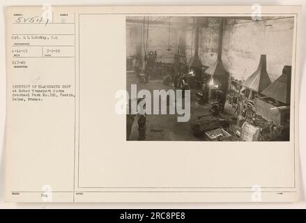 Interior view of a blacksmith shop at Motor Transport Corps. Overhaul Park #702 located in Pantin, Seine, France. The photograph was taken by CPL A.L. Lubatty on April 14, 1919, with the file number 51547. The image shows the working environment of the blacksmiths assigned to the Motor Transport Corps. Stock Photo