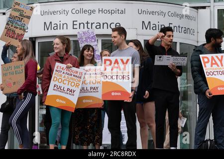 London, UK. 13 July, 2023. Striking National Health Service (NHS) junior doctors rally outside University College Hospital demanding better pay and conditions as they begin the longest walkout in NHS history. Credit: Ron Fassbender/Alamy Live News Stock Photo