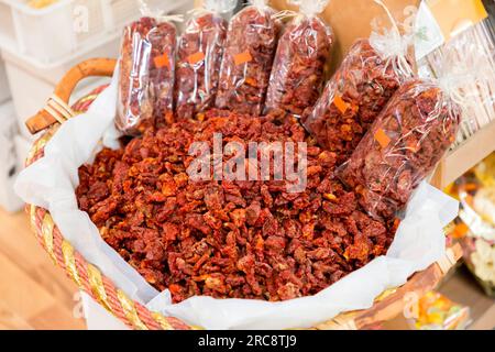 Local sun-dried tomatoes sold at the central market of Florence, Tuscany, Italy. Stock Photo