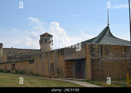The church spire and guard tower at the Old Joliet Prison, which opened in 1858 and was closed and abandoned in 2002. Stock Photo