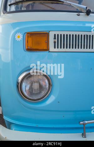 Light blue and white bay window Volkswagen VW T2 camper van. Stock Photo