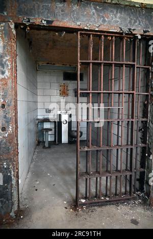A prison cell in the East Cell Block House of the Old Joliet Prison, which opened in 1858 and closed and was abandoned in 2002. Stock Photo