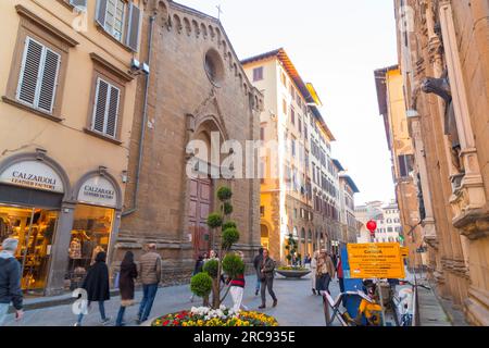 Florence, Italy - April 5, 2022: People walking through the Via dei Calzaiuoli, the most central and busy street in Florence, Tuscany, Italy. Stock Photo