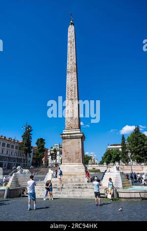 Fountain of the Lions (Fontana dei Leoni) and Egyptian obelisk (Obelisco Flaminio) stand in centre of Piazza del Popolo in Rome, Lazio Region, Italy Stock Photo