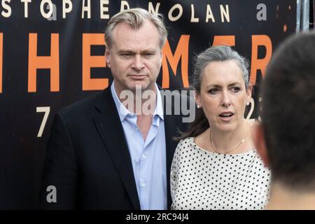 Christopher Nolan and Emma Thomas at the Oppenheimer premiere. The Oppenheimer premiere takes place at Trafalgar Square, London. Fans and cast members Stock Photo