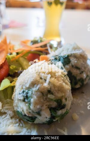 spinat dumplings with mixed salad Stock Photo