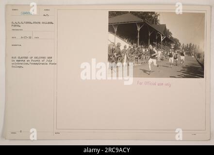 Enlisted men participating in sports activities during a Fourth of July celebration at Pennsylvania State College. The photograph was taken by a photographer affiliated with S.A.T.C. Penna, State College. It is a part of a collection documenting American military activities during World War I. Official use only. Stock Photo