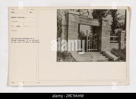 The entrance to a German cemetery of the 141st Regiment Infantry, located on the road to Punch a Fonchette. The entrance is imposing and features symbolic elements. The photograph was taken in 1919 by a French official photographer named Red. The image is part of the collection 'Photographs of American Military Activities during World War One.' Stock Photo