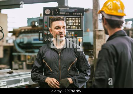 young engineer staff worker talking with senior team supervisor consult discuss about working problem Stock Photo
