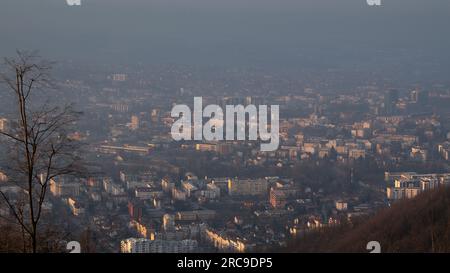 Cityscape of Banja Luka in smog, unhealthy air pollution in big cities Stock Photo