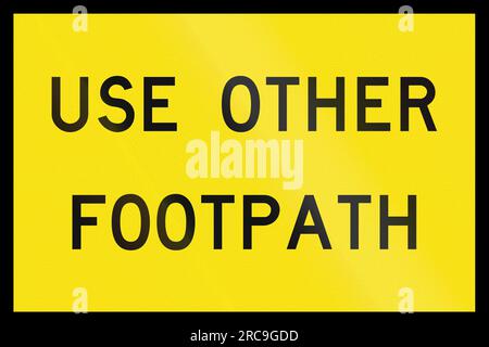 An Australian temporary road sign - Pedestrians use other footpath Stock Photo
