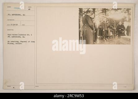 In this photograph, taken at War Prison Barracks No. 1 in Ft. McPherson, Georgia, a funeral is being held for sailor John Ficken. The photograph is numbered 59201 and was taken on May 19, 1919. The photographer is recorded as RECO. Stock Photo