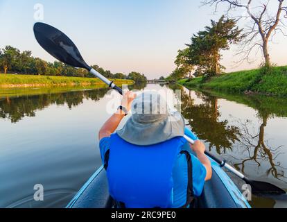 Close up shot of a man kayaking at Lake Overholser, Oklahoma Stock Photo