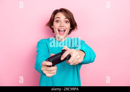 Free: Portrait of an excited pretty girl playing games Free Photo 