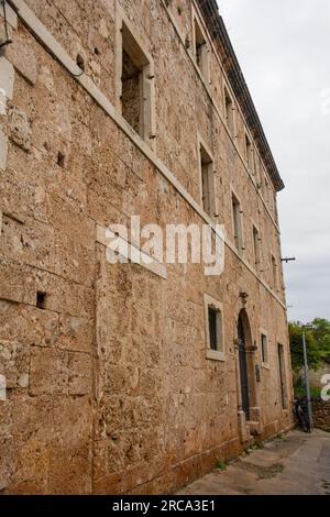 'House Within a House', or Kuca U Kuci, Bol, Brac, Croatia. This is the outer house. In 19th century, a newer house was built around an existing house Stock Photo