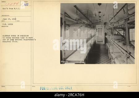 Soldier Glennan arranging the bunks in a ward car of the Army Medical Department's Hospital Train during World War One. These bunks are designed to carry maximum load and provide medical assistance to wounded soldiers. Official use only. June 13, 1918. Stock Photo