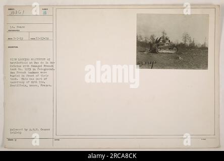 Caption: 'View looking northwest at the battlefield at Fme de la Madeleine, France during World War One. The photograph, taken by Lt. Sears on November 13, 1918, shows a damaged French tank, number 1073, in the foreground. It is noted that two French tankmen were buried in front of their tank. This area was part of the territory held by the 80th Division, located in Nantillois, Meuse, France.' Stock Photo