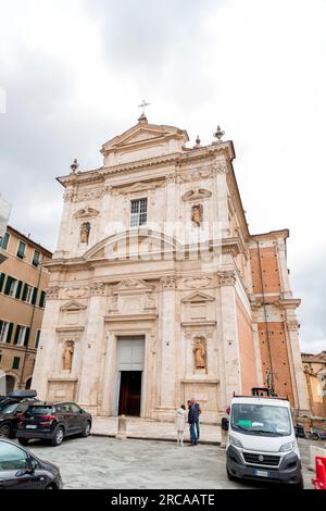 Siena, Italy - APR 7, 2022: Insigne Collegiata di Santa Maria in Provenzano is a late Renaissance-Baroque style, Roman Catholic, collegiate church in Stock Photo