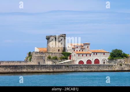 Fort de Socoa, historic coastal defensive fortress protecting the Bay of Saint-Jean-de-Luz and the port, with a circular tower. Ciboure, France Stock Photo
