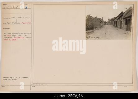 Image showing soldiers from the 16th Regiment of Infantry, 1st Division taking over newly acquired billets in Folleville, France on June 6, 1918. Photograph taken by Pvt. Trabold, S. c. on July 6, 1918. Censored and issued as official documentation. Numbered 14228. Stock Photo