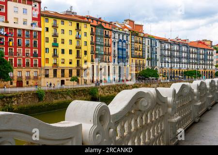 Colorful apartment buildings of the Nervion River In Bilbao, Basque country, Spain. Stock Photo