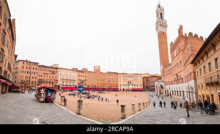 Siena, Italy - APR 7, 2022: The Piazza del Campo, the central square of Siena, Tuscany, Italy. Stock Photo