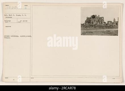 A photograph taken on March 7, 1919, by Corporal Earl E. Evans of the Signal Corps captures a ruined cathedral in Albert, Somme, France. The description and identification number indicate this image is part of the series titled 'Photographs of American Military Activities during World War One.' Stock Photo