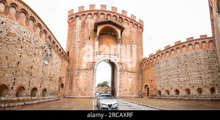 Siena, Italy - APR 7, 2022: Porta Romana is one of the portals in the medieval Walls of Siena. It is located on Via Cassia in Siena, region of Tuscany Stock Photo