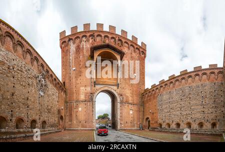 Siena, Italy - APR 7, 2022: Porta Romana is one of the portals in the medieval Walls of Siena. It is located on Via Cassia in Siena, region of Tuscany Stock Photo