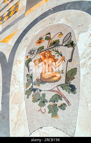 Mosaic detail inside the Galleria Umberto I, a public shopping gallery in Naples, Italy. Built between 1887–1890 Stock Photo