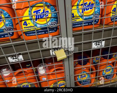 Packages of Procter & Gamble's Tide detergent are locked up to deter shoplifters in a store in New York on Monday, July 3, 2023. Tide is the largest selling detergent in the world. (© Richard B. Levine) Stock Photo
