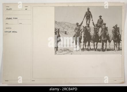 Soldiers participate in a cavalry drill during the 1910s. The image shows a group of mounted soldiers practicing their maneuvers. The photograph is part of a collection of American military activities during World War One, with a record number of 64,977. Stock Photo