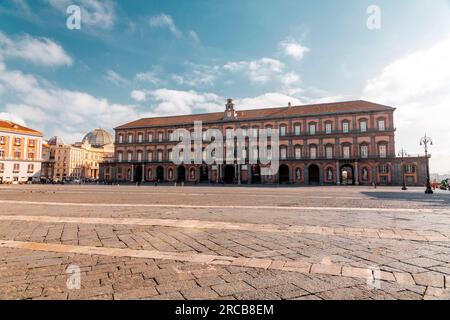 Naples, Italy - April 9, 2022: Exterior view of Palazzi Reale di Napoli, Naples Royal Palace and the National Library building in Naples, Campania, It Stock Photo
