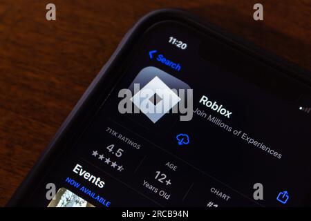 In this photo illustration, the Roblox app seen displayed on a smartphone  screen and a Roblox logo in the background. (Photo by Thiago Prudencio /  SOPA Images/Sipa USA Stock Photo - Alamy