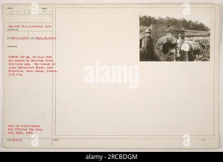 FRENCH 340 mm. or 13.9 INCH gun being operated by American Coast Artillery men during World War One. The photograph, taken on September 26, 1918, shows the gun with its breech open. This scene was captured in Baleycourt Woods, near Nixeville, Dept. Meuse, France, at 3:20 P.M. The image was held by the A.E.F. Censor for Official Use Only and issued with W.P.C. Notes. Stock Photo