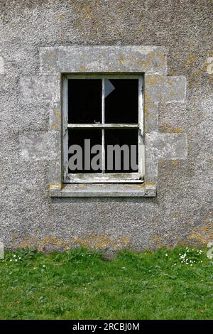 Abandoned croft house, North Uist, Outer Hebrides, Scotland. Ground floor window Stock Photo