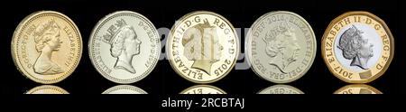 UK £1 coins from the first issued in 1983 to the current bimetallic coin featuring 4 coin portraits of Queen Elizabeth II Stock Photo