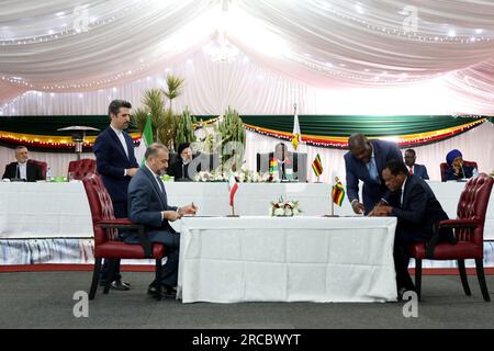 Harare, Harare, Zimbabwe. 13th July, 2023. Zimbabwe President EMMERSON MNANGAGWA (R) meets Iranian President EBRAHIM RAISI (L) in Harare. (Credit Image: © Iranian Presidency via ZUMA Press Wire) EDITORIAL USAGE ONLY! Not for Commercial USAGE! Stock Photo