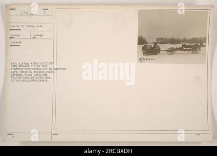 Bat. A, 142nd Field Artillery, of the 64th Brigade, is shown in the photograph coming into position with a French 155mm howitzer. The commanding officer, Capt. Byron B. Bragdon, can be seen with the artillery tractor hauling the guns. The location is Le Valdahon, Doubs, France. This photograph was taken on April 5, 1919, by Lt. R.W. Sears. The photo is designated as number 514721 and was issued on February 2, 1919. Stock Photo