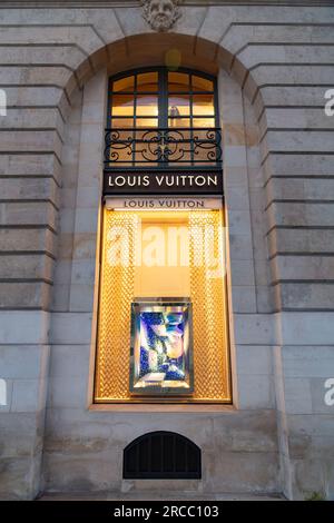 Paris, France - January 20, 2022: Store sign board of Louis Vuitton, the famous French luxury clothing brand, Paris. Stock Photo