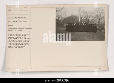 The image shows a group of thirty-three telephone operators proficient in French and English leaving for duty in France during World War One. The detachment includes one chief operator, four supervisors, and twenty-eight operators, led by Miss Clair D. Banker from Hoboken, New Jersey. Stock Photo