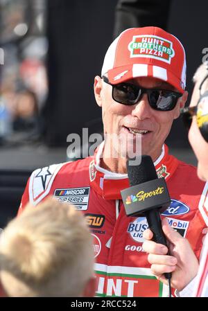 ATLANTA, GA - JULY 09: Kevin Harvick (#4 Stewart Haas Racing Hunt Brothers  Pizza Ford) and Ross Chastain (#1 Trackhouse Racing Worldwide Express  Chevrolet) race side by side the NASCAR Cup Series