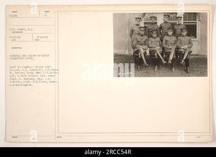 Caption: General and staff of the Motor Transport Corps pose for a photograph. From left to right in the front row: Lt. Col. D.K. Mitchell, Col. James W. Furlow, Brig. Gen. C.B. Drake, Col. A. Owen Seamen. In the second row: Capt. B. McMahan, Maj. J.M. Ritchie, Capt. H.S. Roome, and Capt. A.W. Herrington. Photo taken on June 19, 1919, by Sgt. Combs. Stock Photo