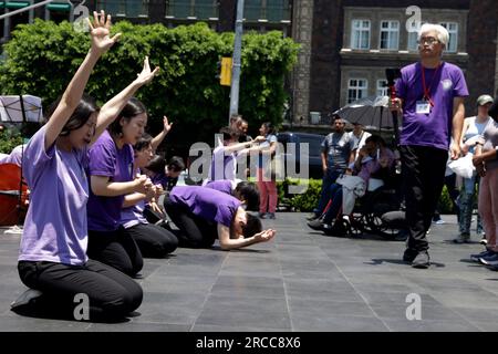 Mexico City, Mexico. 13th July, 2023. The Korean Milal Missionary Choir during its presentation of the World Tour called '2023 World Milal Grand Praise March'', on the public road next to the Metropolitan Cathedral in the Zocalo in the City of Mexico. on July 13, 2023 in Mexico City, Mexico (Credit Image: © Luis Barron/eyepix via ZUMA Press Wire) EDITORIAL USAGE ONLY! Not for Commercial USAGE! Stock Photo