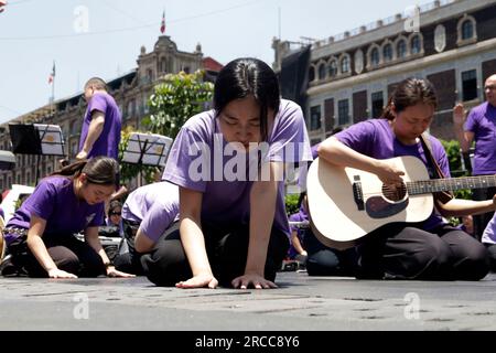 Mexico City, Mexico. 13th July, 2023. July 13, 2023, Mexico City, Mexico: The Korean Milal Missionary Choir during its presentation of the World Tour called “2023 World Milal Grand Praise March”, on the public road next to the Metropolitan Cathedral in the Zocalo in the City of Mexico. on July 13, 2023 in Mexico City, Mexico (Photo by Luis Barron/Eyepix Group/Sipa USA). Credit: Sipa USA/Alamy Live News Stock Photo