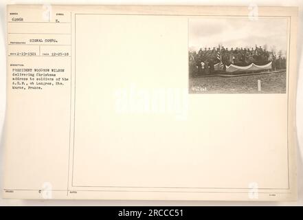 President Woodrow Wilson addressing American soldiers of the A.E.F. at Langres, Hte. Marne, France on Christmas Day in 1918. The photograph, taken by the Signal Corps, was issued as part of a commemorative series in honor of Wilson's visit. (Number: 62868, Photographer: Signal Corps, Date Taken: 12-25-18, Description: President Woodrow Wilson delivering Christmas Day address to soldiers of the A.E.F. at Langres, Hte. Marne, France.) Stock Photo