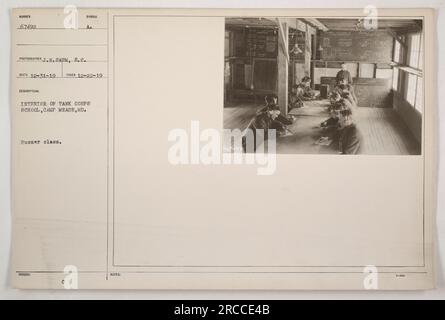 Interior view of Tank Corps School at Camp Meade, MD. This photograph, taken on December 22, 1919, captures a buzzer class in session. The image was photographed by J.H. Saum of the Signal Corps. This photo is part of a collection of American military activities during World War One. Stock Photo